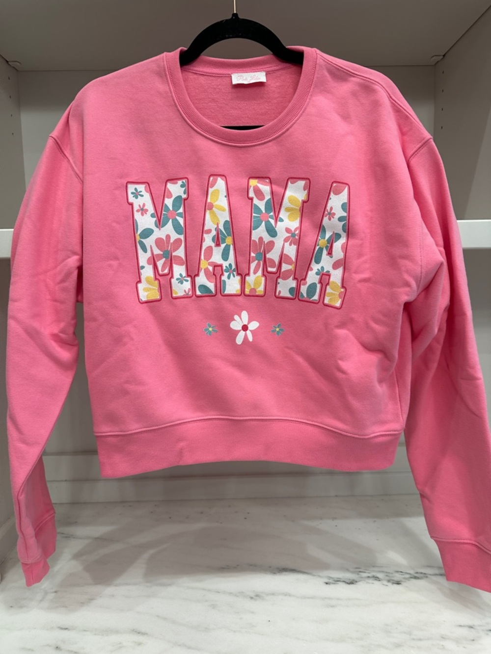 Pink Lily small pink sweatshirt.  Floral Mama logo .  Like new